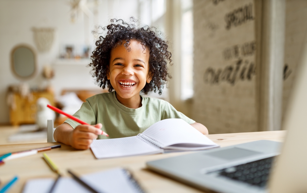 Distance,Education.,Smiling,African,American,Child,Schoolboy,Studying,Online,On